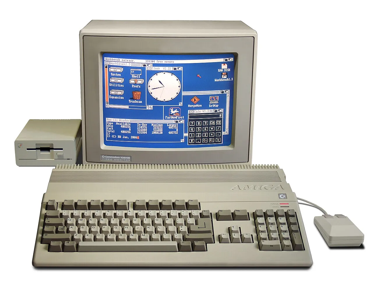Commodore Amiga 500 con monitor, unidad de disco y mouse